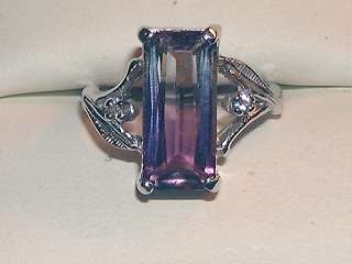   AMETRINE STONE 3.20CT., TWO SMALL DIAMONDS AND FACE 15.5mmx 8 mm
