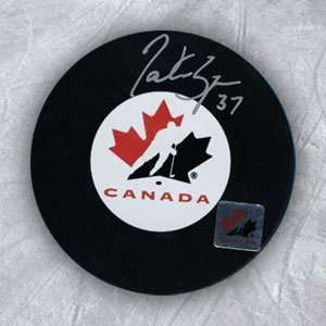  PATRICE BERGERON Team Canada SIGNED Olympic Hockey PUCK 