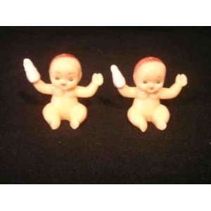  12 Small Sitting Plastic Babies Holding a Bottle 1.25 