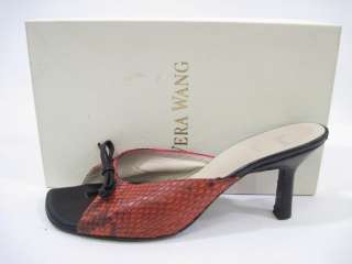 you are bidding on a pair of vera wang orange python slides heels in a 