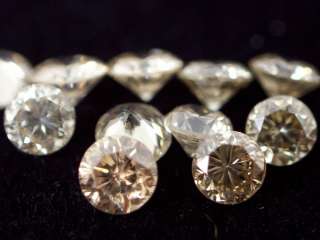 11 loose Round cut Assorted champagne Diamonds SI1 0.70 cttw  