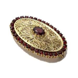   in Yellow 18 karat Gold with Garnet, form Oval, weight 11.1 grams
