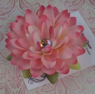 This listing is for one pink water lily clip. This 