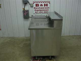 You are looking at a 50 Stainless steel table w/ Ice cream freezer 
