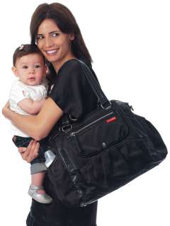 Carry your babys diapers and accessories while looking stylish. View 