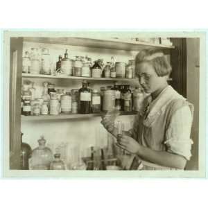  Photo A Third year high school girl in the chemical laboratory 