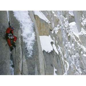  A Man Climbing a Snow Covered Mountain in Karakoram 