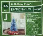 blue artificial christmas tree  